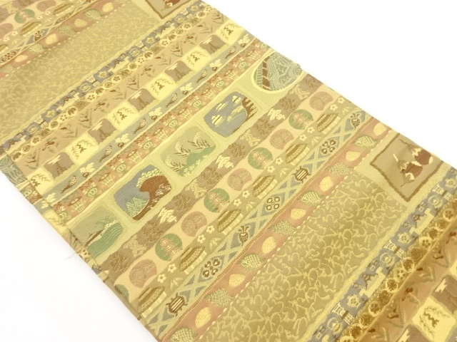 横段に野菜・家屋・草花模様織出し名古屋帯